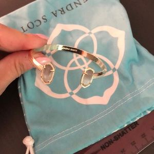 Kendra Scott gold bracelet with grey stone